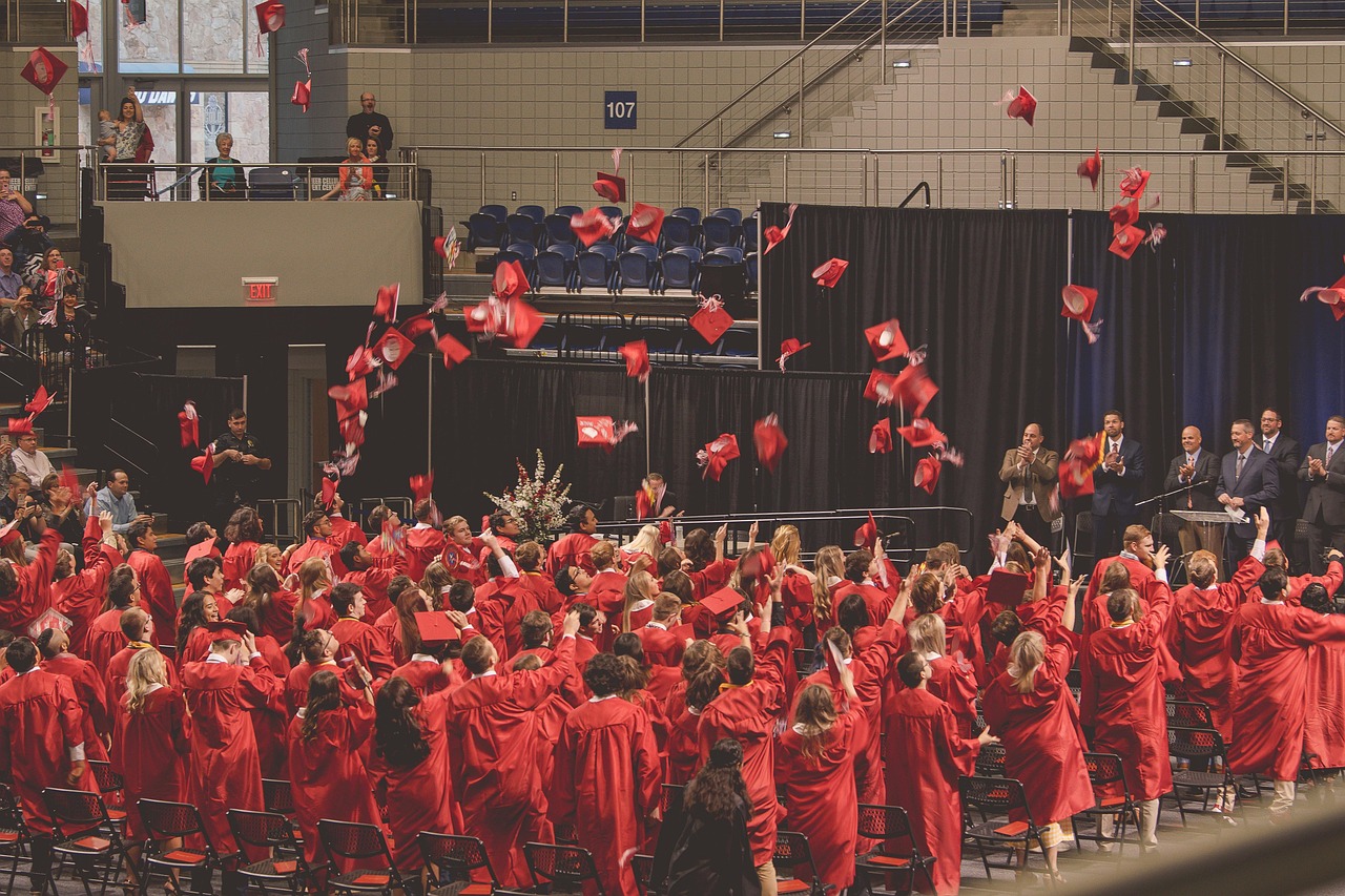 Law School Majors Throwing graduation caps in the air