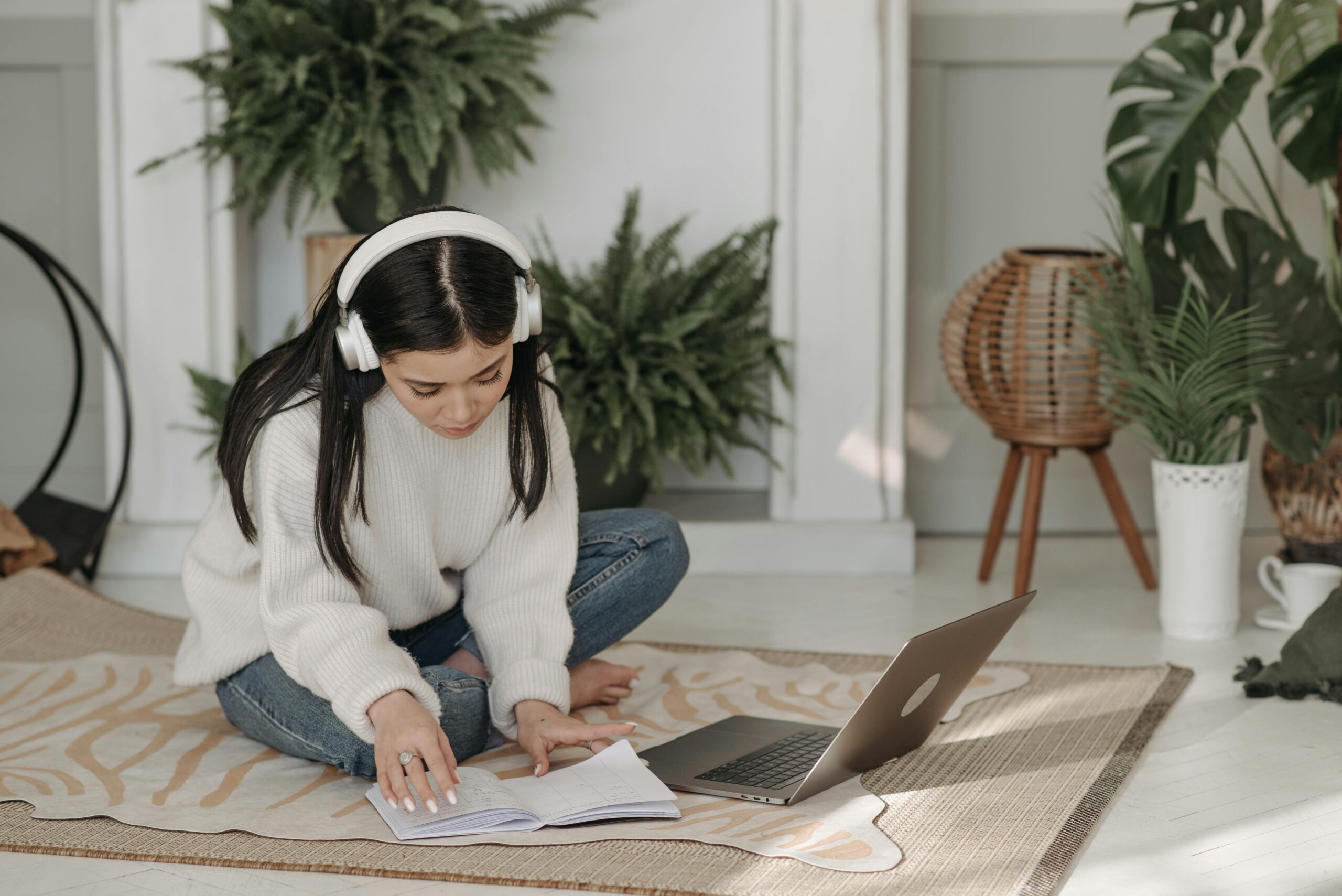 AAMC section bank Vol 2 Woman on Head Phones Sitting Crossed Legged on Carpet