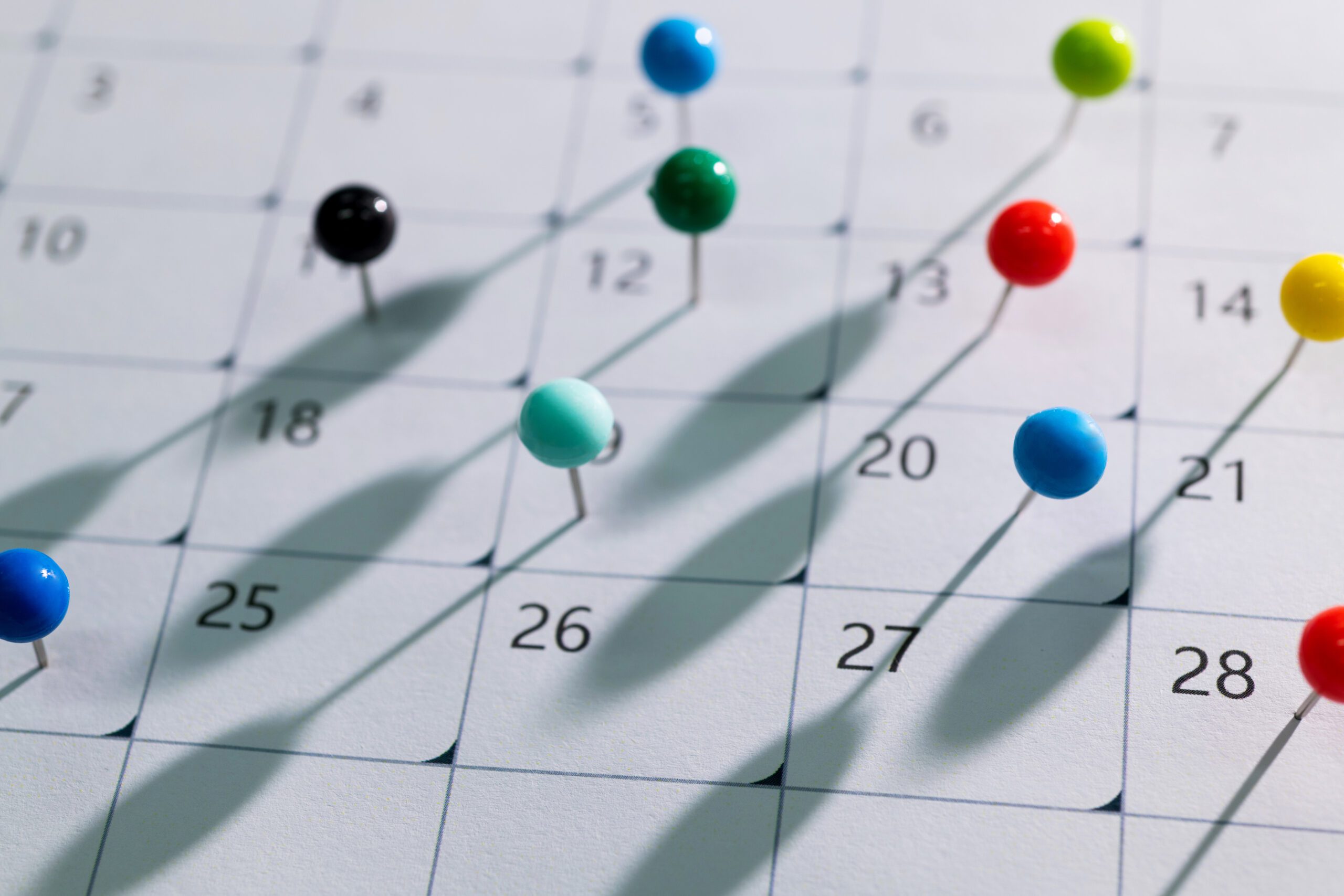 Colored pins on the calendar. MCAT test date