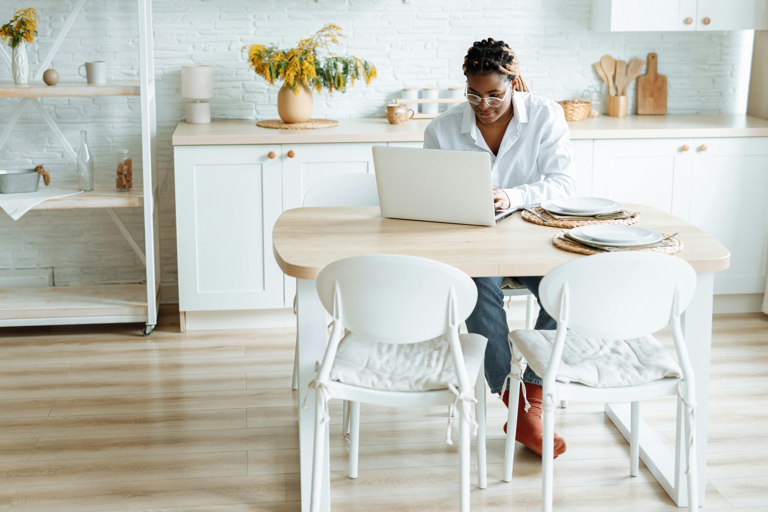 A Woman Using a Laptop While Sitting at the Dining Table Non traditional medical student study habits